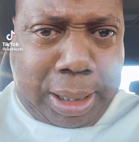 Close Up Of Man's Face With TikTok GIF