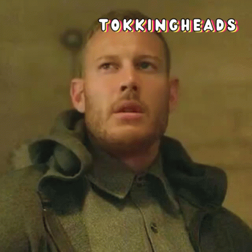 Close Up Of Man's Face With Tokingheads GIF