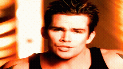 Close Up Of Man's Face With Yellow Background GIF