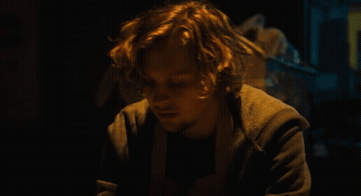 Close Up Of Man's Face With Yellow Light GIF