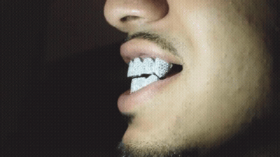 Close Up Of Man's Mouth With Diamond Teeth GIF