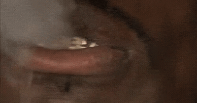 Close Up Of Man's Mouth With Ring Saying I Need Money GIF