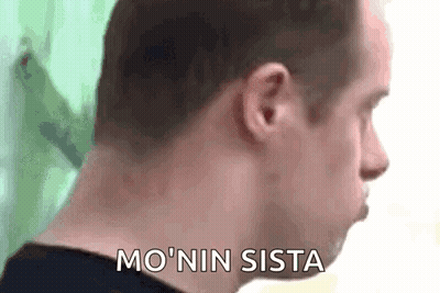 Close Up Of Man's Neck Saying Mo Nin Sista GIF