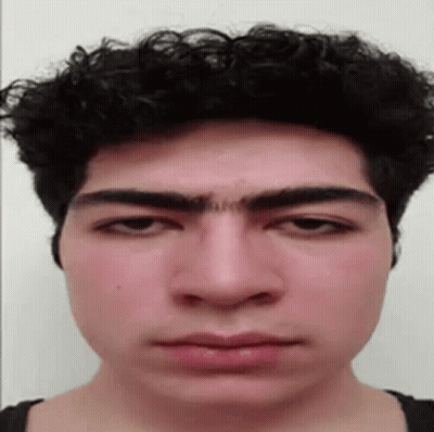 Close Up Of Man's Serious Face GIF