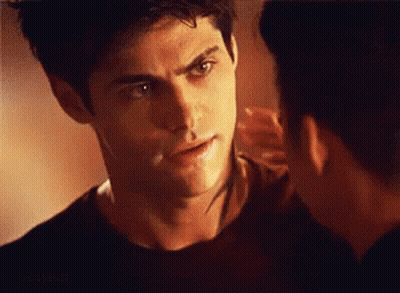 Close-Up Of Man Touching Another Man's Face GIF