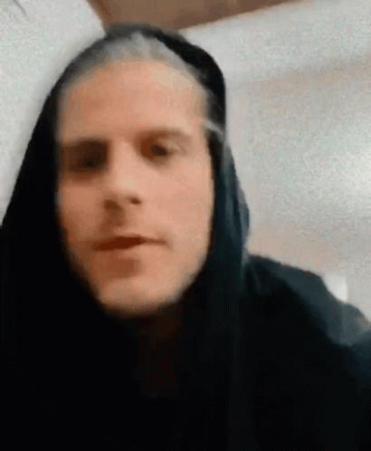 Close Up Of Man Wearing Black Hooded Jacket GIF