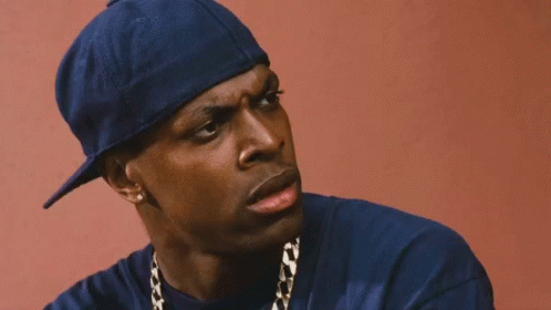 Close Up Of Man Wearing Blue Hat And Gold Chain GIF
