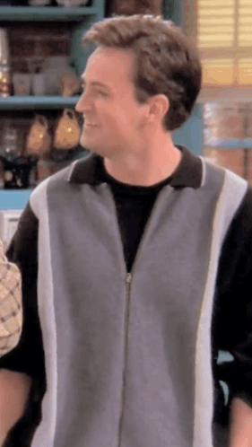 Close Up Of Man Wearing Gray And White Jacket GIF
