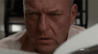 Close Up Of Man With A.M.C. Behind Him GIF