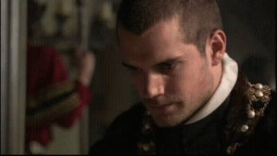 Close Up Of Man With Beard And Pearl Necklace GIF