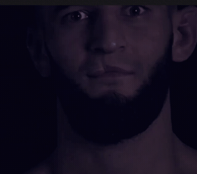 Close Up Of Man With Beard In Dark GIF