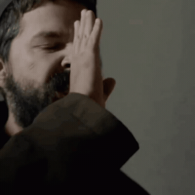 Close Up Of Man With Beard Making Funny Face GIF
