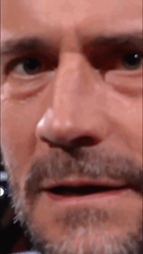 Close Up Of Man With Beard Making Funny Face GIF