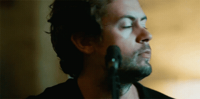 Close Up Of Man With Eyes Closed And Beard GIF