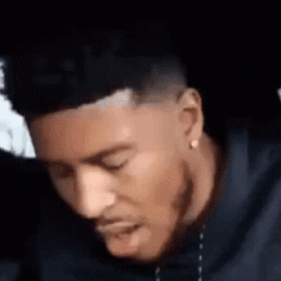 Close Up Of Man With Eyes Closed And Beard GIF