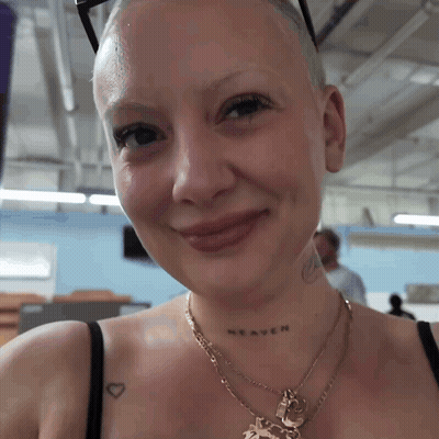 Close Up Of Man With Group Behind Him GIF