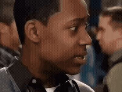 Close Up Of Man With Group Behind Him GIF