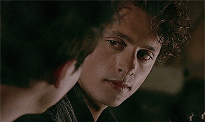 Close Up Of Man With Head In Background GIF