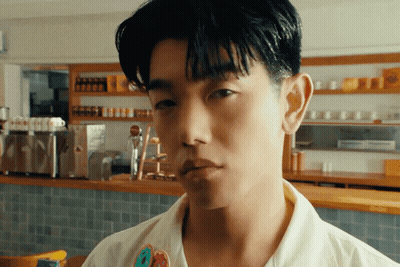 Close Up Of Man With I Love You Sticker On Shirt GIF