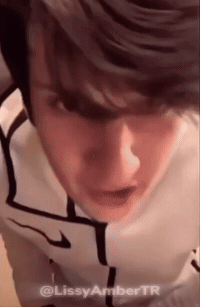 Close Up Of Man With Lissy Amber Tr Text GIF