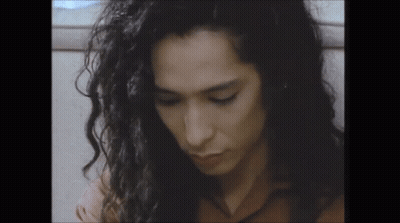 Close Up Of Man With Long Curly Hair GIF