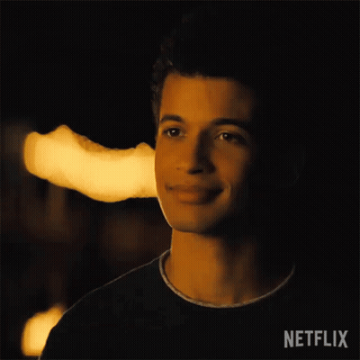 Close Up Of Man With Netflix Logo GIF
