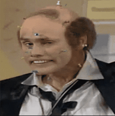 Close Up Of Man With Pins In Head GIF