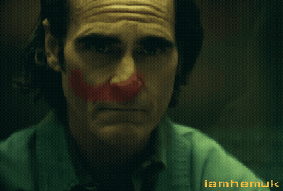 Close Up Of Man With Red Paint Saying Iamhermuk GIF