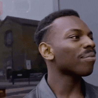 Close Up Of Man With Shaved Head GIF
