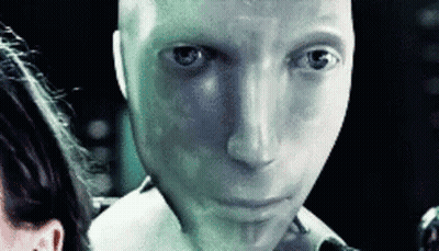 Close Up Of Man With Woman Behind Him GIF