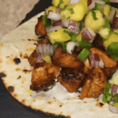 Close Up Of Meat And Vegetable Tortilla GIF