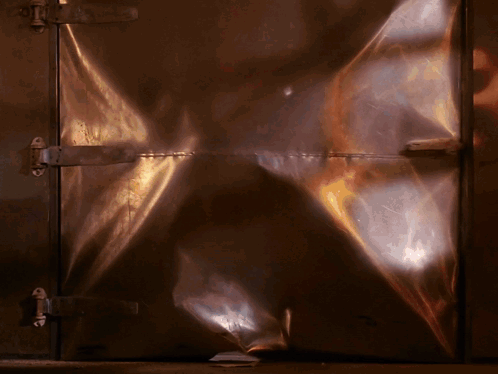 Close Up Of Metal Door With Light Reflection GIF