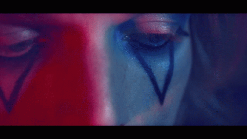 Close Up Of Mouth With Red And Blue Lighting GIF