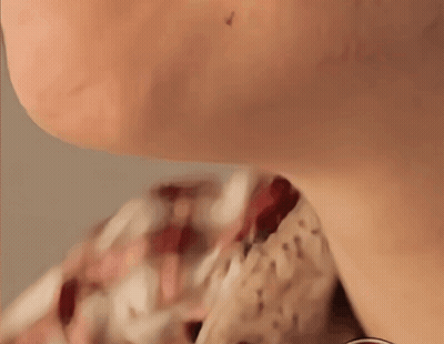Close Up Of Neck And Ear With Earring GIF