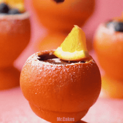 Close Up Of Orange With Slice GIF