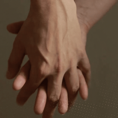 Close Up of People Holding Hands