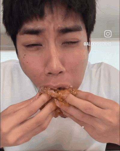 Close Up of Person Eating Sandwich with Alexyosiexhd