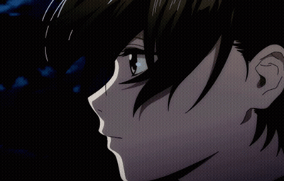 Close Up Of Person Face On Black Background GIF