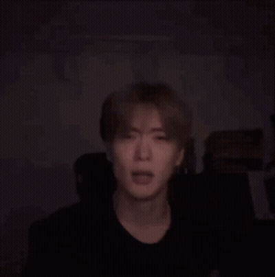 Close Up Of Person Face With Black Background GIF