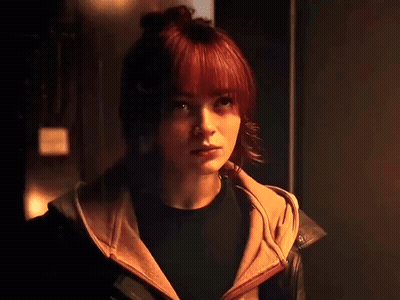Close Up Of Person Face With Sign GIF