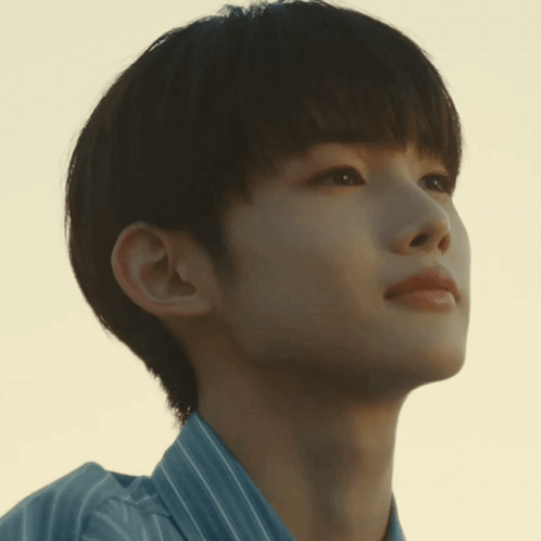 Close Up Of Person Face With Striped Shirt GIF