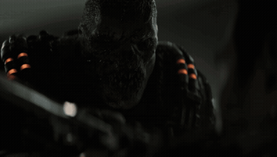 Close Up Of Person Holding Gun GIF
