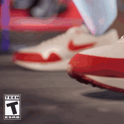 Close Up Of Person In Red And White Nike Shoes GIF