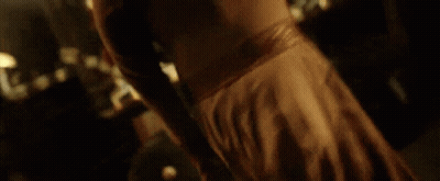 Close Up Of Person's Arm In Dark Room GIF