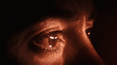 Close Up Of Person's Eye With Light GIF