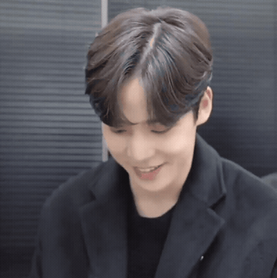 Close Up Of Person's Face In Black Jacket GIF