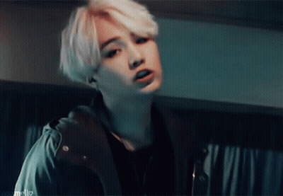 Close Up Of Person's Face In Dark Room GIF