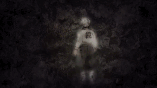 Close Up Of Person's Face In Dark Room GIF