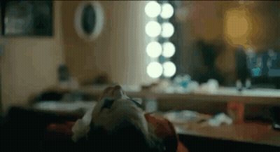Close Up Of Person's Face In Dressing Room GIF