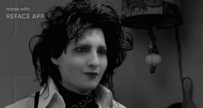 Close Up Of Person's Face In Front Of Lamp GIF